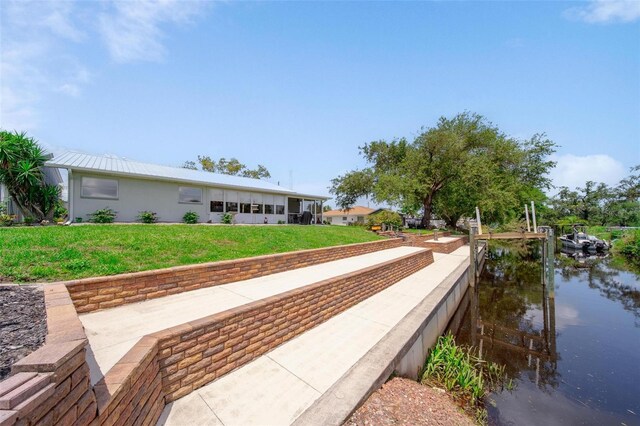 405 Ridgecrest Dr, Punta Gorda, FL 33982 - dock featuring a water view and a yard