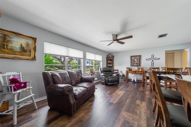 405 Ridgecrest Dr, Punta Gorda, FL 33982 - living area featuring ceiling fan, wood finished floors, and baseboards