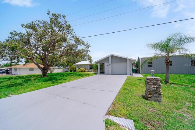 405 Ridgecrest Dr, Punta Gorda, FL 33982 - view of front of home featuring concrete driveway and a front lawn