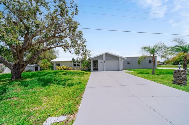 405 Ridgecrest Dr, Punta Gorda, FL 33982 - ranch-style house with driveway, a front yard, and an attached garage