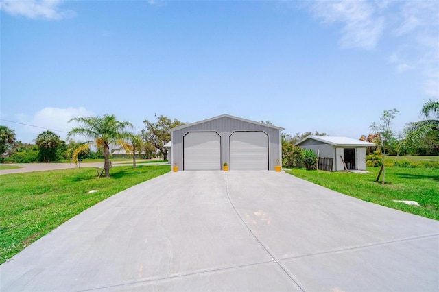 405 Ridgecrest Dr, Punta Gorda, FL 33982 - view of front facade with a garage, a front yard, and an outdoor structure