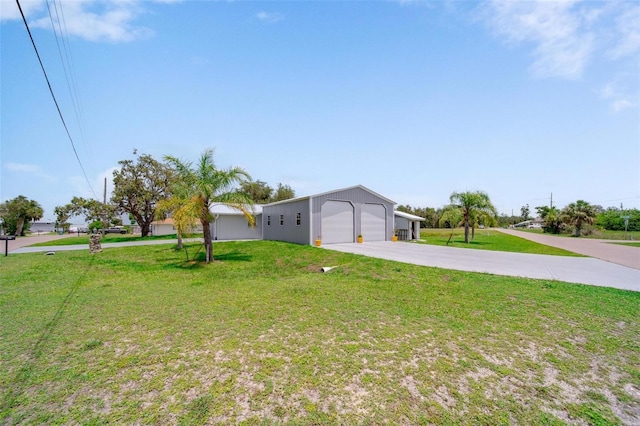 405 Ridgecrest Dr, Punta Gorda, FL 33982 - view of front of home featuring a front lawn and concrete driveway