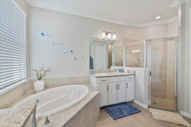15039 Black Cherry Way, Punta Gorda, FL 33955 - full bath featuring vanity, a bath, a shower stall, crown molding, and wood finished floors