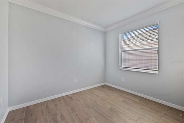 15039 Black Cherry Way, Punta Gorda, FL 33955 - empty room featuring light wood finished floors and ornamental molding