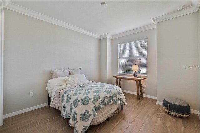 15039 Black Cherry Way, Punta Gorda, FL 33955 - bedroom featuring crown molding and light wood finished floors