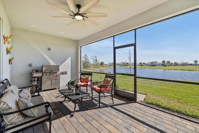 15039 Black Cherry Way, Punta Gorda, FL 33955 - sunroom featuring a water view, ceiling fan, and an outdoor living space