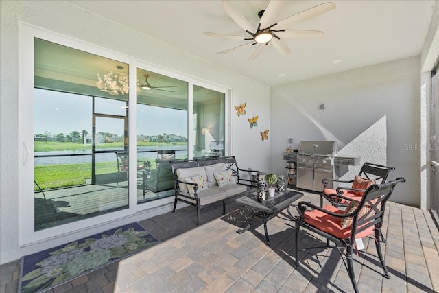 15039 Black Cherry Way, Punta Gorda, FL 33955 - view of patio / terrace featuring grilling area, a water view, and a ceiling fan