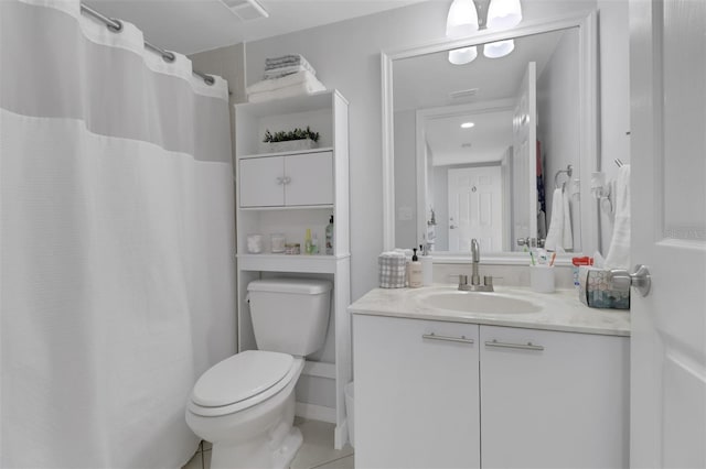 196 Furse Lakes Cir Unit A6, Naples, FL 34104 - full bathroom featuring vanity, toilet, curtained shower, and tile patterned flooring