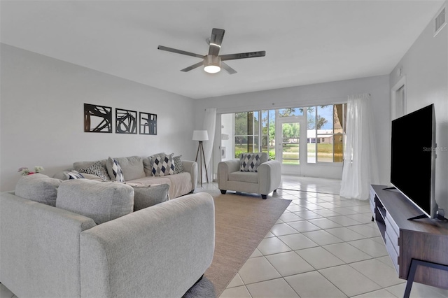 196 Furse Lakes Cir Unit A6, Naples, FL 34104 - living area featuring light tile patterned floors and ceiling fan