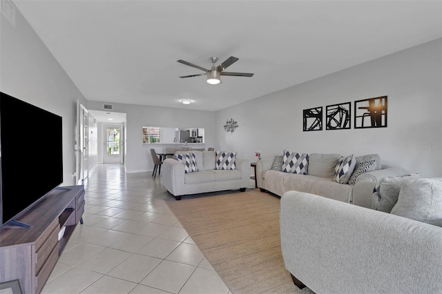 196 Furse Lakes Cir Unit A6, Naples, FL 34104 - living room with light tile patterned flooring and ceiling fan