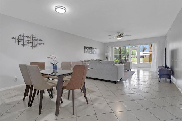 196 Furse Lakes Cir Unit A6, Naples, FL 34104 - dining room featuring ceiling fan, light tile patterned floors, and baseboards