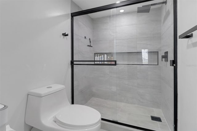 196 Furse Lakes Cir Unit A6, Naples, FL 34104 - full bathroom featuring toilet and a stall shower