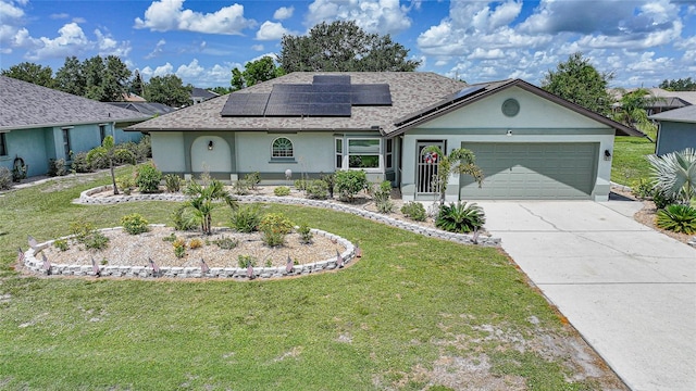 37 Pepe Ct, Punta Gorda, FL 33983 - single story home with stucco siding, a front yard, an attached garage, driveway, and roof mounted solar panels