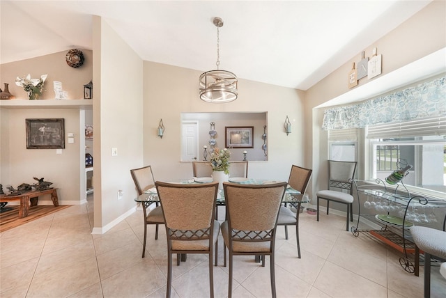 37 Pepe Ct, Punta Gorda, FL 33983 - dining area with vaulted ceiling, light tile patterned floors, and a chandelier