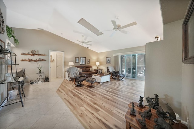 37 Pepe Ct, Punta Gorda, FL 33983 - living area featuring a ceiling fan, vaulted ceiling, and light tile patterned floors