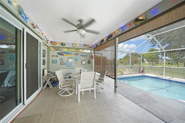 37 Pepe Ct, Punta Gorda, FL 33983 - view of swimming pool featuring a ceiling fan, a patio, a pool, and glass enclosure