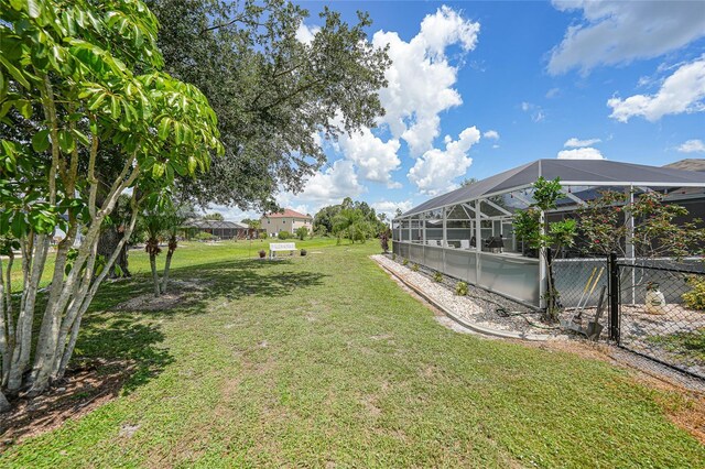 37 Pepe Ct, Punta Gorda, FL 33983 - view of yard featuring glass enclosure