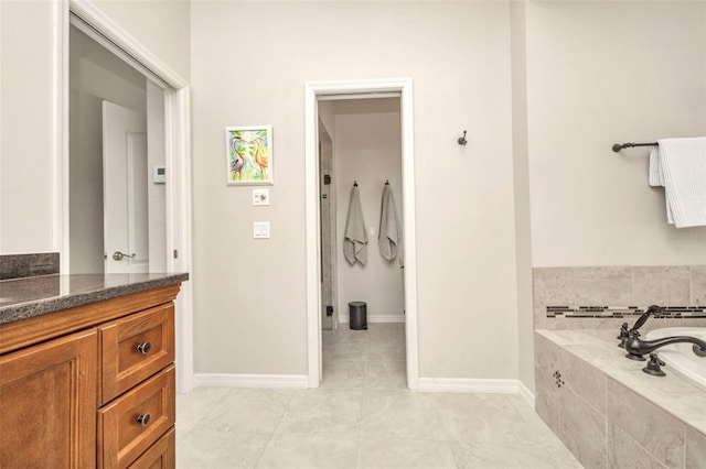 250 Freeport Ct, Punta Gorda, FL 33950 - full bathroom featuring a garden tub, tile patterned floors, and vanity