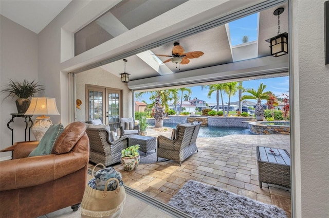 250 Freeport Ct, Punta Gorda, FL 33950 - view of patio featuring french doors, a pool with connected hot tub, a ceiling fan, and outdoor lounge area