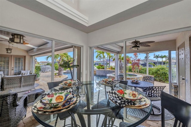 250 Freeport Ct, Punta Gorda, FL 33950 - sunroom with a ceiling fan, plenty of natural light, outdoor dining space, and vaulted ceiling