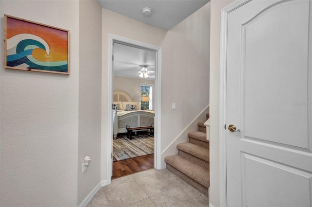 250 Freeport Ct, Punta Gorda, FL 33950 - hallway with stairs and light tile patterned floors