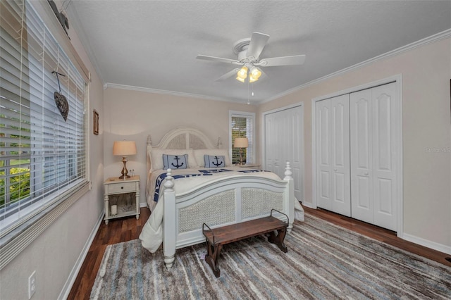 250 Freeport Ct, Punta Gorda, FL 33950 - bedroom featuring wood finished floors, two closets, crown molding, and a ceiling fan