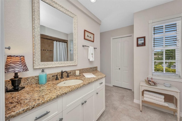250 Freeport Ct, Punta Gorda, FL 33950 - full bathroom featuring vanity, tile patterned flooring, and curtained shower