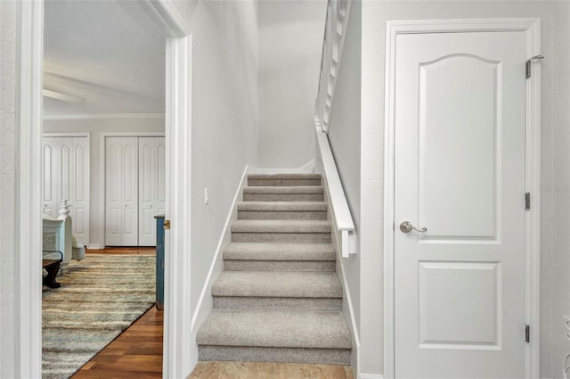 250 Freeport Ct, Punta Gorda, FL 33950 - stairway with ornamental molding and wood finished floors