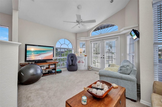 250 Freeport Ct, Punta Gorda, FL 33950 - carpeted living room with french doors, lofted ceiling, and ceiling fan