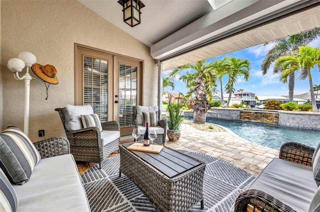 250 Freeport Ct, Punta Gorda, FL 33950 - view of patio / terrace with french doors, an outdoor pool, and an outdoor living space