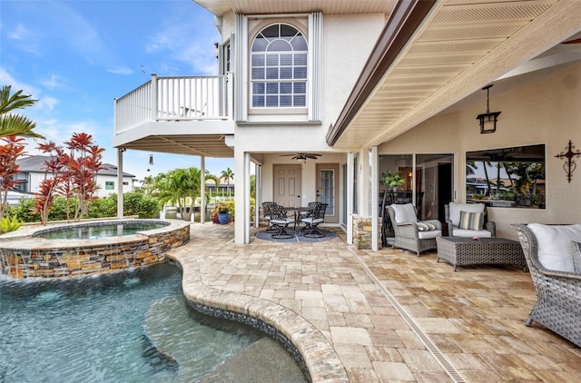 250 Freeport Ct, Punta Gorda, FL 33950 - view of swimming pool with a patio area, a pool with connected hot tub, a ceiling fan, and outdoor dining area