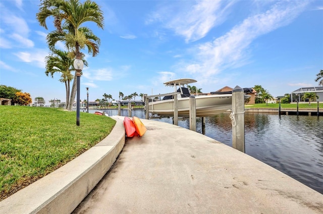 250 Freeport Ct, Punta Gorda, FL 33950 - dock area featuring boat lift, a yard, and a water view