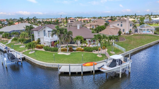 250 Freeport Ct, Punta Gorda, FL 33950 - back of property featuring boat lift, a residential view, and a water view