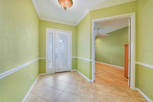 1527 Aqui Esta Dr Unit 3, Punta Gorda, FL 33950 - tiled foyer entrance with ornamental molding and baseboards