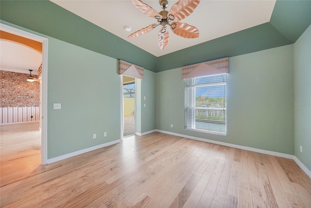 1527 Aqui Esta Dr Unit 3, Punta Gorda, FL 33950 - empty room featuring a ceiling fan, wood finished floors, and a smoke detector