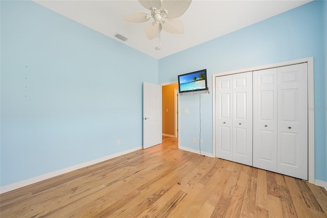1527 Aqui Esta Dr Unit 3, Punta Gorda, FL 33950 - unfurnished bedroom featuring light wood finished floors, a closet, and ceiling fan