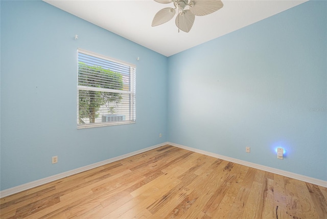 1527 Aqui Esta Dr Unit 3, Punta Gorda, FL 33950 - empty room featuring wood finished floors and ceiling fan