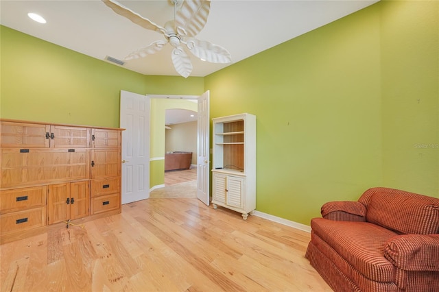 1527 Aqui Esta Dr Unit 3, Punta Gorda, FL 33950 - living area featuring ceiling fan, arched walkways, light wood-style flooring, and recessed lighting