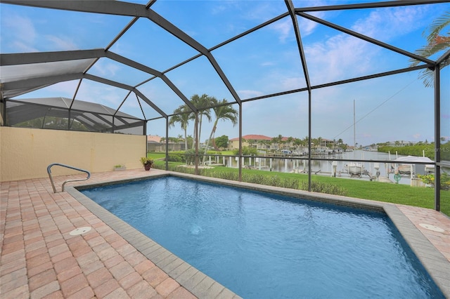 1527 Aqui Esta Dr Unit 3, Punta Gorda, FL 33950 - outdoor pool with a water view, a patio, a lanai, a dock, and a yard