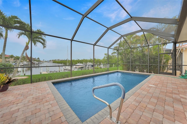 1527 Aqui Esta Dr Unit 3, Punta Gorda, FL 33950 - outdoor pool with a water view, a patio area, and a lanai
