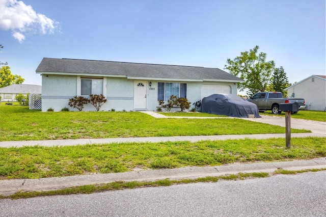 5983 Hobhill Ave, North Port, FL 34287 - ranch-style home with an attached garage, driveway, a front yard, and stucco siding