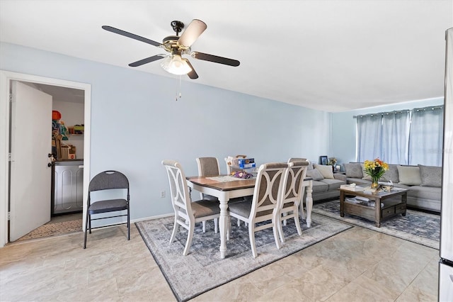 5983 Hobhill Ave, North Port, FL 34287 - dining space with ceiling fan and washer / dryer