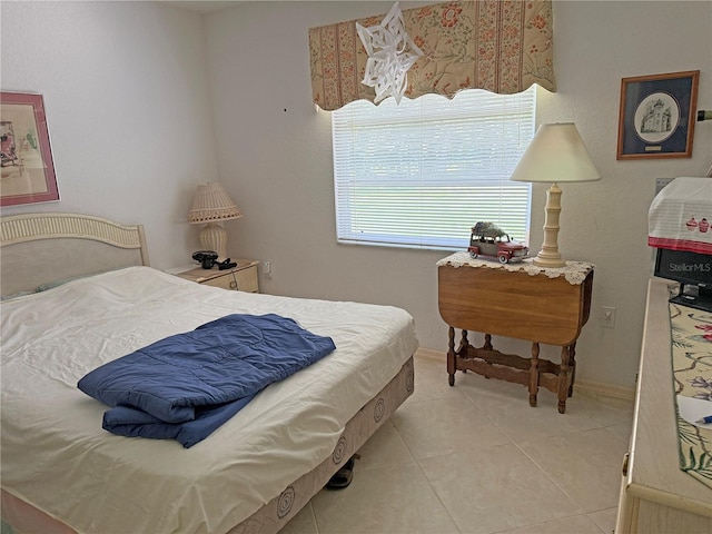 26312 Deep Creek Blvd, Punta Gorda, FL 33983 - bedroom featuring light tile patterned flooring and baseboards