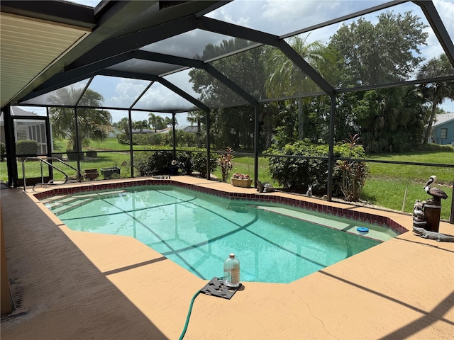 26312 Deep Creek Blvd, Punta Gorda, FL 33983 - swimming pool featuring glass enclosure, a patio, and a yard