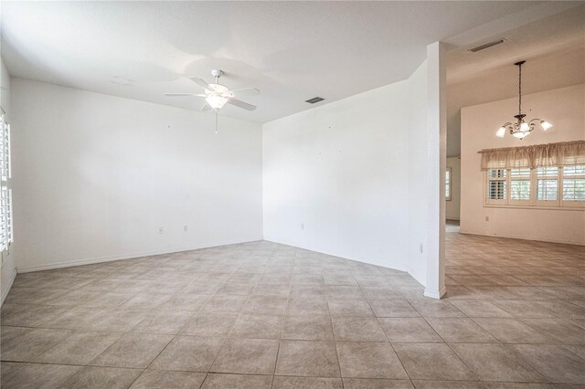 23101 Hillsdale Ave, Port Charlotte, FL 33954 - unfurnished room featuring a chandelier, ceiling fan, and baseboards