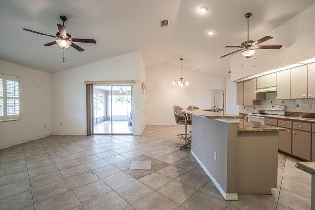 23101 Hillsdale Ave, Port Charlotte, FL 33954 - kitchen featuring white range with electric stovetop, a ceiling fan, open floor plan, and high vaulted ceiling