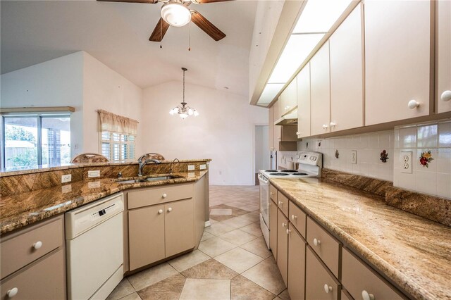 23101 Hillsdale Ave, Port Charlotte, FL 33954 - kitchen with white appliances, a sink, under cabinet range hood, a ceiling fan, and tasteful backsplash