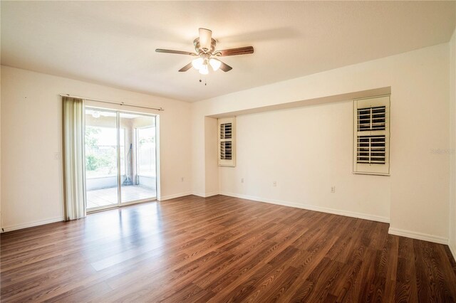 23101 Hillsdale Ave, Port Charlotte, FL 33954 - spare room with a ceiling fan, dark wood-style flooring, and baseboards