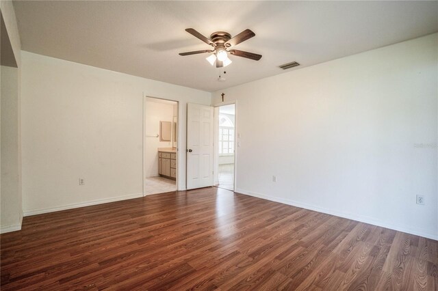 23101 Hillsdale Ave, Port Charlotte, FL 33954 - spare room with ceiling fan, wood finished floors, and baseboards
