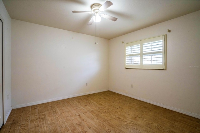 23101 Hillsdale Ave, Port Charlotte, FL 33954 - empty room with light wood-style flooring, ceiling fan, and baseboards